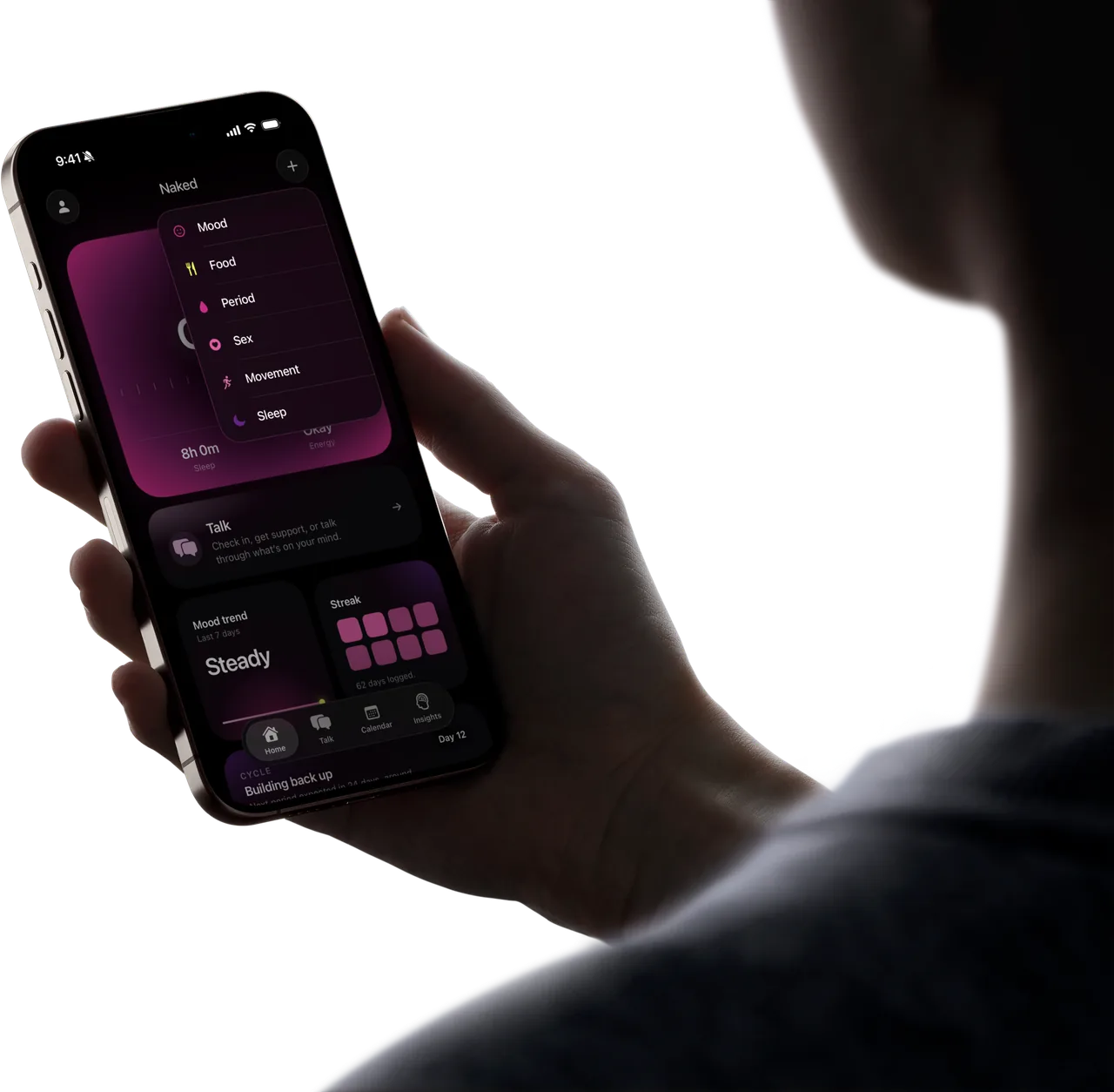 Naked tracking menu open on a phone held in low light